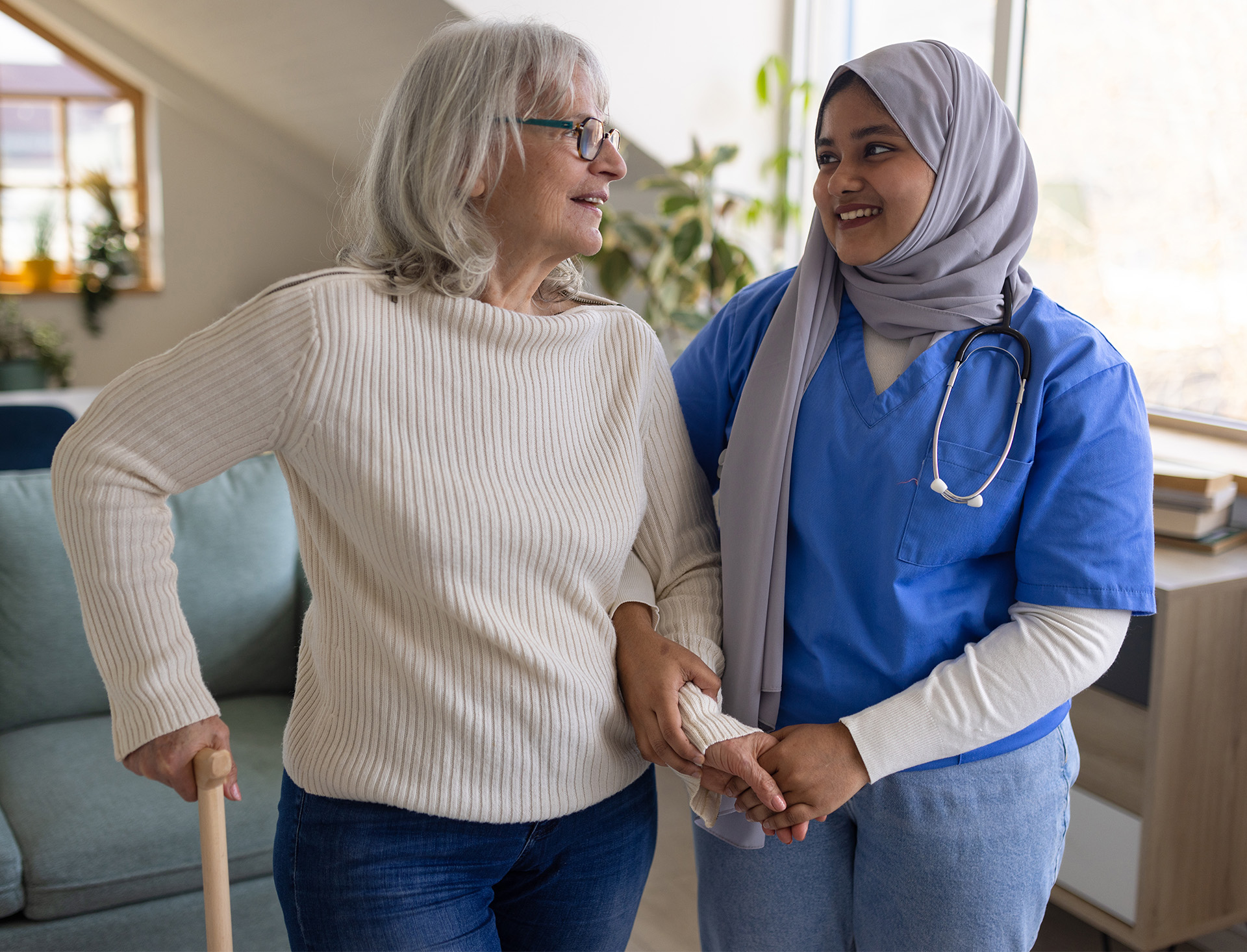 Patient walking in a hospital.